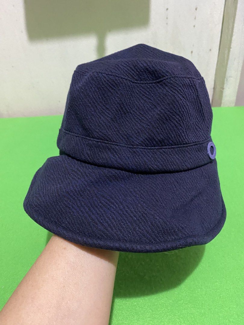 The Redface Since 1966 Bucket Hat Navy Blue (Category: Activewear) located in Manila. Submitted by resi.diaz (Listing ID 1445890899, Image 2). Description: - Navy blue bucket hat from The Redface. - Features a textured fabric. - Small circular detail on the side with 'The Redface Since 1966' inscription. - Classic bucket hat style. - Ideal for sunny days or casual wear..