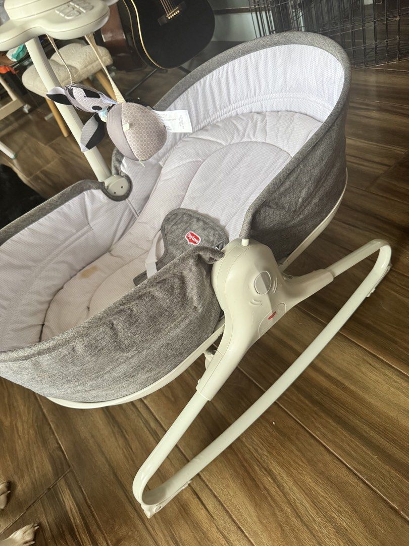 Tiny Love Baby Rocker (Category: Infant Playtime) located in Makati City. Submitted by aceequeue (Listing ID 1445805989, Image 3). Description: - Gentle rocking motion to soothe your baby - Engaging mobile with toys for entertainment - Padded seat for maximum comfort - Secure straps for baby's safety - Minor stains on seat pad, otherwise in good working order. Kayo nalang po maglaba 😆 RFS di na kasya kay Baby Original price purchased 7500 sa ora