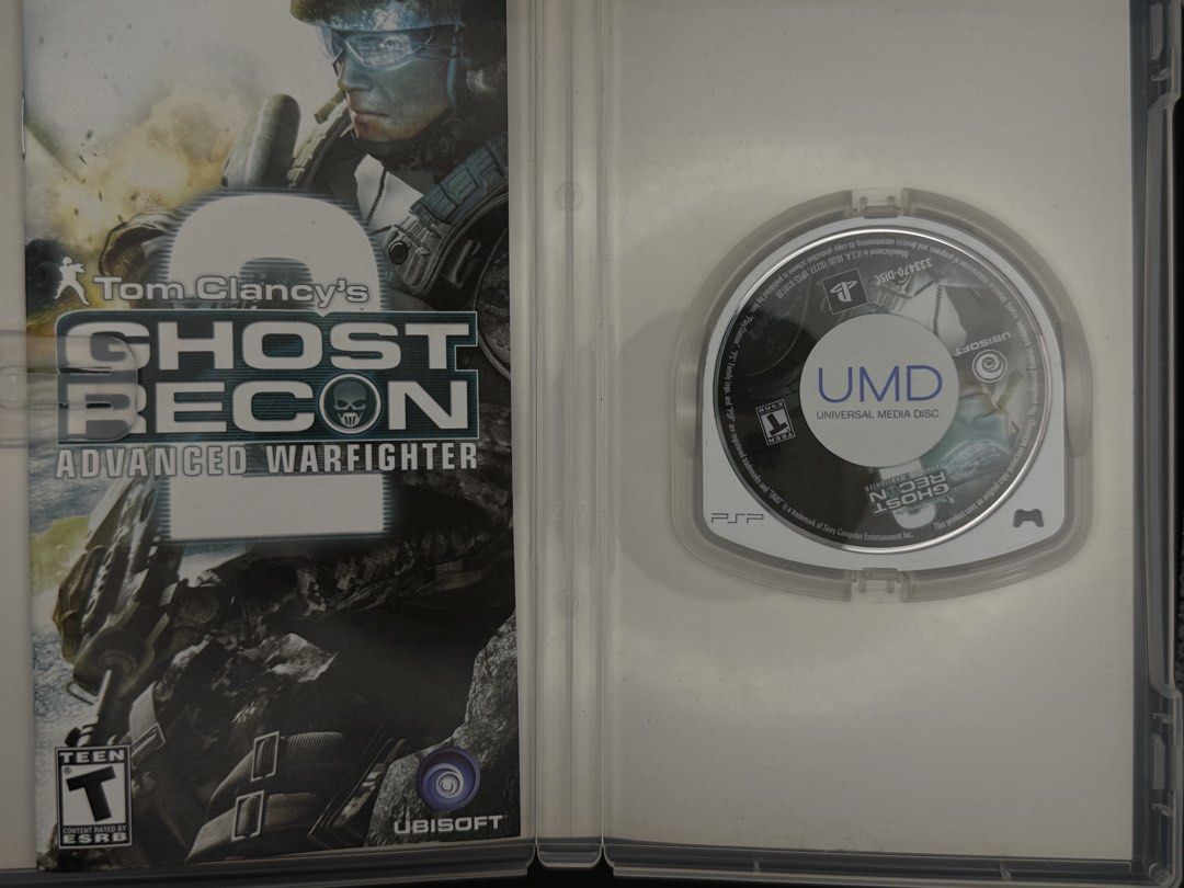 Tom Clancy's Ghost Recon 2 Advanced Warfighter PSP UMD Game (Category: PlayStation) located in Las Pinas. Submitted by cjdmc (Listing ID 1445858074, Image 3). Description: - Tom Clancy's Ghost Recon 2 Advanced Warfighter for PSP - UMD Disc Version - Intense tactical combat gameplay - Compelling storyline - Solo and ad-hoc multiplayer modes available - Ideal for fans of military shooter games.