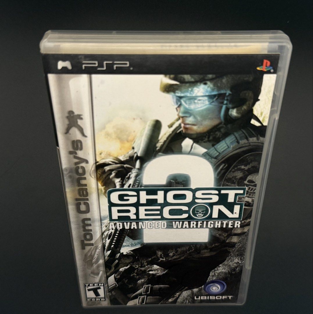 Tom Clancy's Ghost Recon 2 Advanced Warfighter PSP UMD Game (Category: PlayStation) located in Las Pinas. Submitted by cjdmc (Listing ID 1445858074, Image 1). Description: - Tom Clancy's Ghost Recon 2 Advanced Warfighter for PSP - UMD Disc Version - Intense tactical combat gameplay - Compelling storyline - Solo and ad-hoc multiplayer modes available - Ideal for fans of military shooter games.