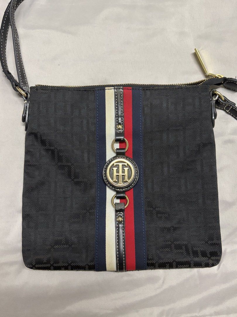 Tommy Hilfiger Crossbody Bag (Category: Cross-body Bags) located in Antipolo. Submitted by 210user (Listing ID 1445938618, Image 1). Description: READ - check photos for flaws - my mom removed the logo (obvious stitches) inside the bag since the leather logo is chirping - authentic from the states • no return and refund • payment first policy message me for inquiries! payment: gcash delivery: ggx or sdd .
