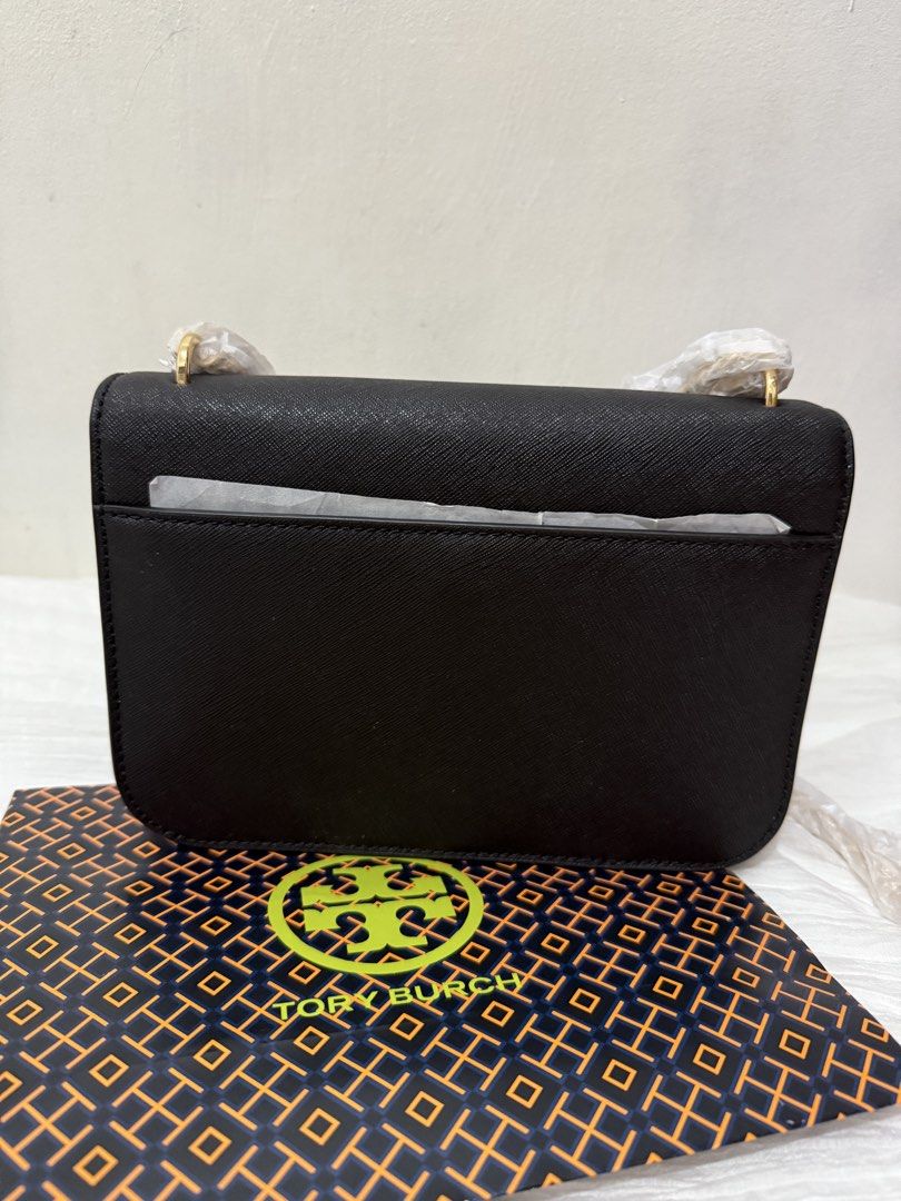 Tory Burch Emerson (Category: Luxury Bags & Wallets) located in Cainta. Submitted by angellyy_ (Listing ID 1445802663, Image 2). Description: Tory Burch Emerson Chain convertible (sling - shoulder) Brand new - fresh from Canada Tag still intact With original packaging and paper bag No dust bag (not bought in retail store) .