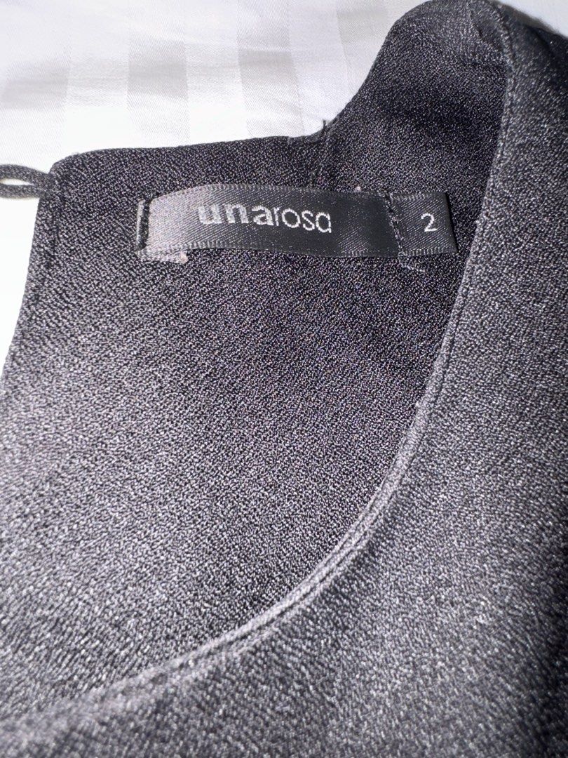 Unarosa Black Asymmetrical Layered top (Category: Blouses) located in Quezon City. Submitted by cam000 (Listing ID 1445816087, Image 2). Description: - Brand: Unarosa - Color: Black - Size: 2 - Design: Sleeveless - Hemline: Asymmetrical with a layered effect .