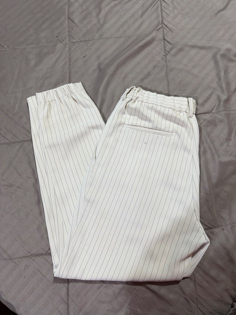Uniqlo White Trousers S (Category: Other Bottoms) located in Las Pinas. Submitted by bloomwithjoyph (Listing ID 1445885636, Image 2). Description: Uniqlo White Trousers S With pinstripe Fits 26-28, 13 inches waist, 35 inches length With mini ballpen stain (unnoticeable) Rfs decluttering Las pinas J&T sf starts at 50 pesos .