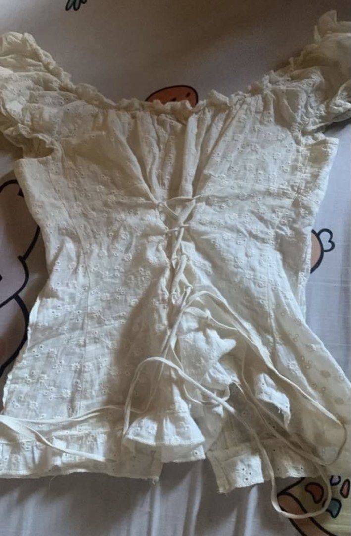 White Eyelet Lace Off-Shoulder Puff Sleeve Top (Category: Blouses) located in Manila. Submitted by cas83273391902 (Listing ID 1445839488, Image 2). Description: pm if interested.