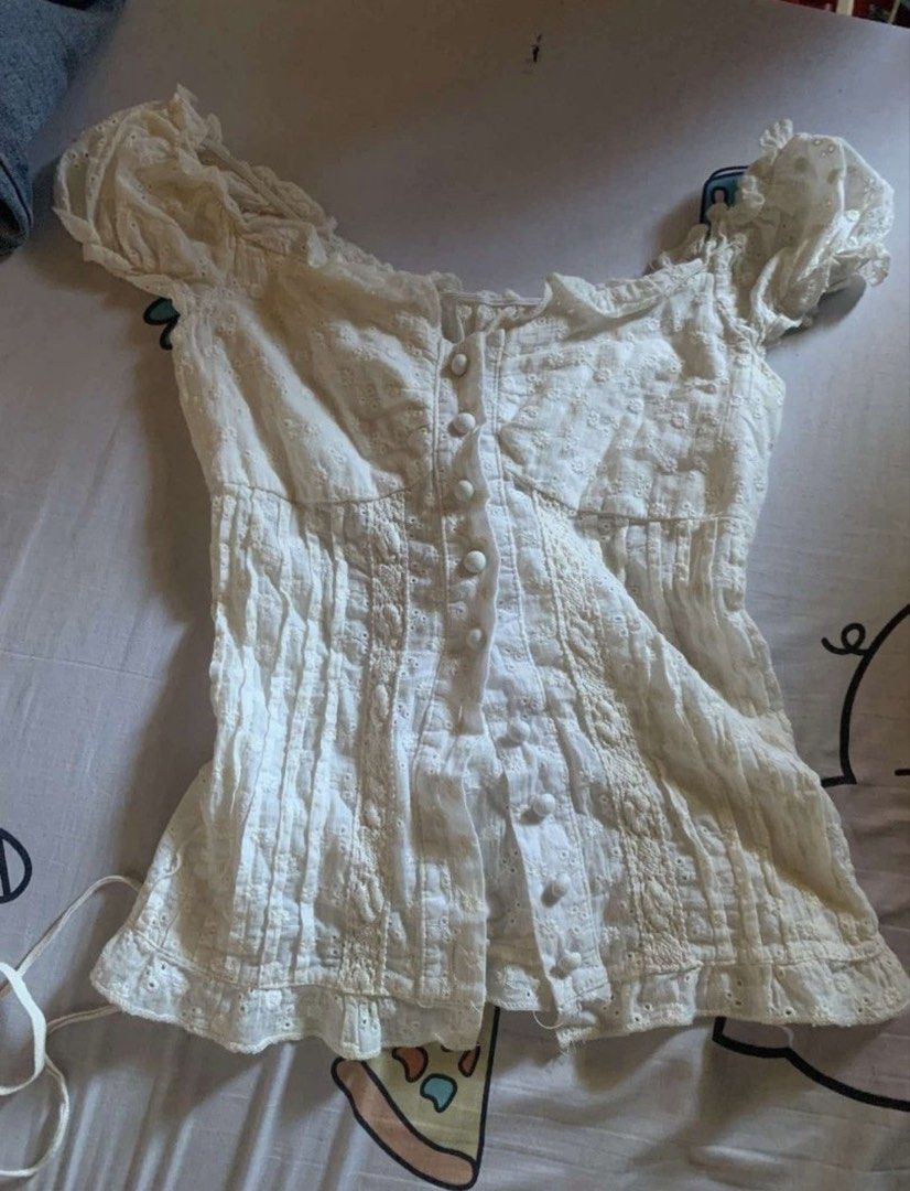 White Eyelet Lace Off-Shoulder Puff Sleeve Top (Category: Blouses) located in Manila. Submitted by cas83273391902 (Listing ID 1445839488, Image 1). Description: pm if interested.