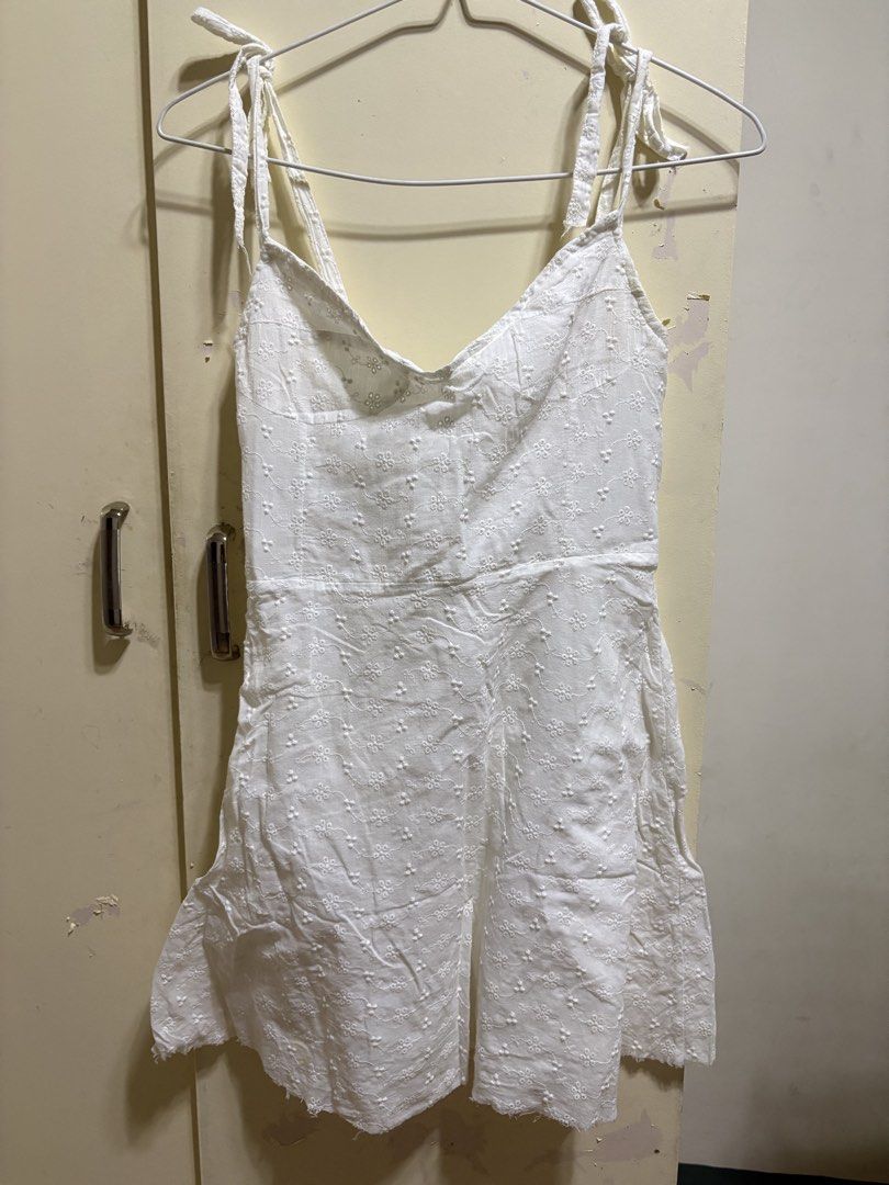White Eyelet Tie-Strap Mini Flared Dress XS-S (Category: Dresses) located in Solano. Submitted by zaillan (Listing ID 1445968467, Image 1). Description: - Adjustable tie straps on shoulders - Comfortable smocked back - Trendy raw edge hem - Ideal for summer days and beach trips.