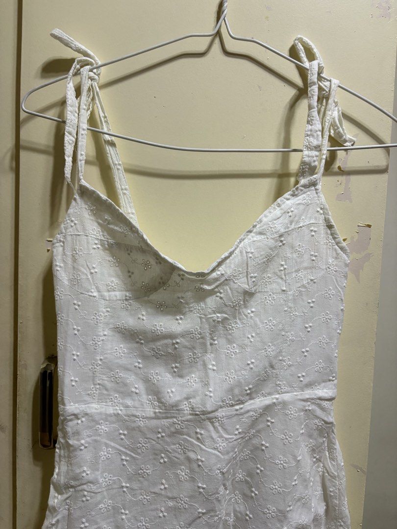 White Eyelet Tie-Strap Mini Flared Dress XS-S (Category: Dresses) located in Solano. Submitted by zaillan (Listing ID 1445968467, Image 3). Description: - Adjustable tie straps on shoulders - Comfortable smocked back - Trendy raw edge hem - Ideal for summer days and beach trips.