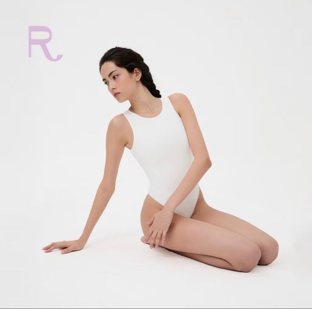 White Round Neck Bodysuit - Recess (Category: Sleeveless) located in Narvacan. Submitted by pammyness (Listing ID 1445865455, Image 1). Description: Best dupe for Patton but better since it’s cheaper. The best local brand for body suit that can compete to international brands. Trust me I’ve tried it all. Worn only once. Small to medium frames. For reference: Bust - 34A Waist - 37” Hips - 42” Rfs. Gained weight.