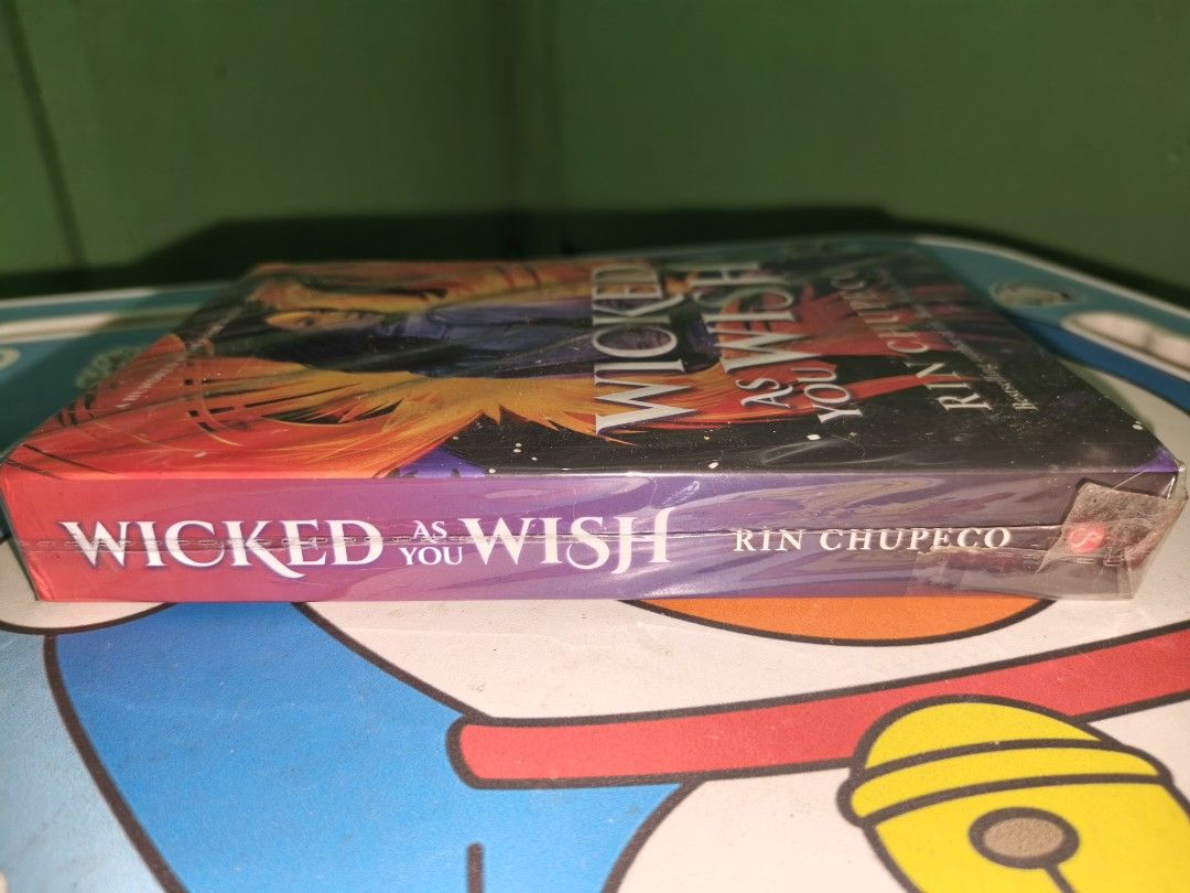 Wicked as You Wish by Rin Chupeco (Category: Storybooks) located in Cavite. Submitted by jannede (Listing ID 1445971615, Image 2). Description: Book 1 in the trilogy A Hundred Names for Magic Wicked As You Wish paperback slight tanning and foxing.