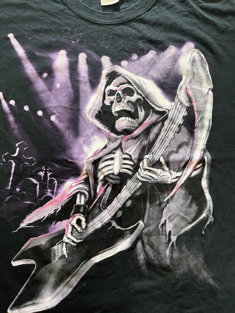 Y2K Emo Grunge Guitar Skull Grim Reaper (Category: Tshirts & Polo Shirts ) located in Quezon City. Submitted by rnb-collection (Listing ID 1445963001, Image 2). Description: Forsale‼️ Y2K Emo Grunge Guitar Skeleton Grim Reaper Tshirt Gildan Heavy Cotton Size XL 29x24 Brand New Condition 10/10 Color rate No issues Made in USA 🇺🇸 600+sf MOD - JnT or Lalamove MOP - Gcash 📌No long reservations, Payment First Open for Video Call Message me if ur in