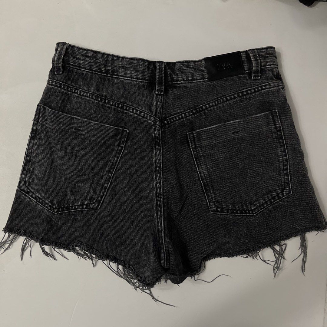Zara Black Denim Tattered Shorts (Authentic) (Category: Shorts) located in General Trias. Submitted by 1992thelabel (Listing ID 1445893186, Image 3). Description: - Zara black denim shorts - High-waisted style - Frayed hem detail - Classic five-pocket design - Made in Bangladesh - Ideal for casual outfits.