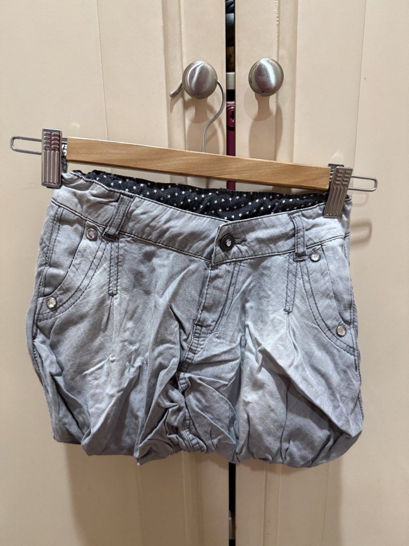 Zara Grey Bubble Skirt with Stud Embellishments (Category: Babies & Kids Fashion) located in Caloocan City. Submitted by oceans18 (Listing ID 1445923545, Image 1). Description: - Grey bubble shorts - Stud details on back pockets - Inner waistband with star pattern - Button and zip front closure - Unique design, perfect for casual wear.