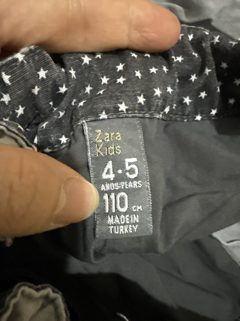 Zara Grey Bubble Skirt with Stud Embellishments (Category: Babies & Kids Fashion) located in Caloocan City. Submitted by oceans18 (Listing ID 1445923545, Image 3). Description: - Grey bubble shorts - Stud details on back pockets - Inner waistband with star pattern - Button and zip front closure - Unique design, perfect for casual wear.