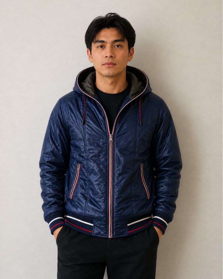 0003 - MIKE KURTIS Hooded Puffer Bomber Jacket (Category: Coats, Jackets and Outerwear) located in Silang. Submitted by ctb.ph (Listing ID 1446094711, Image 2). Description: 🏷️BRAND: Mike Kurtis (Authentic / High Spirited) 🎨COLOR: Deep Navy Blue with khaki inner lining. 📐SIZE & FIT: Large (L) W - 20 Inch L - 28 Inch 💎 CONDITION: Excellent, pre-loved condition. No noticeable stains or tears. All zippers are fully functional. Drawstrings has si