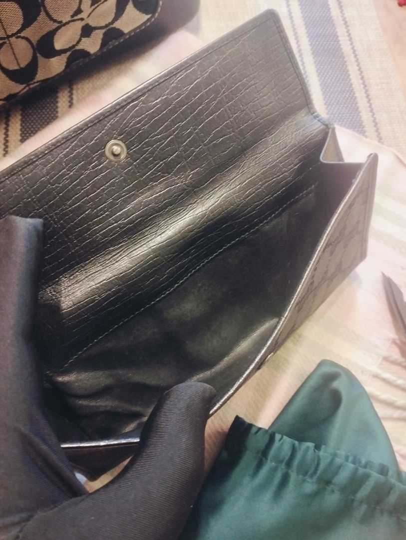 100% Authentic Gucci Continental Wallet (Category: Luxury Bags & Wallets) located in Pasig City. Submitted by ariasaldana (Listing ID 1446025876, Image 3). Description: This is a pre-loved Gucci Black GG canvas horsebit continental wallet in signature jacquard monogram canvas, black leather trim, and iconic silver-tone horsebit ring clasp..