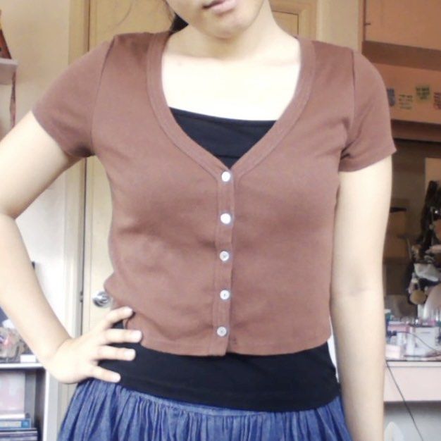 cotton on light brown short sleeve button crop top (Category: Blouses) located in Manila. Submitted by avie.declutters (Listing ID 1445987565, Image 1). Description: .ᐟ Kindly look through ALL photos carefully before sending an offer .ᐟ Inquiries will only be entertained if regarding size, flaws, or RFS ✦ payment: GCash, bank transfer (NO COD) ✦ delivery: J&T, Lalamove (same-day delivery) ✦ meet-ups: not available ⧽ Accepted offers are given 24 h
