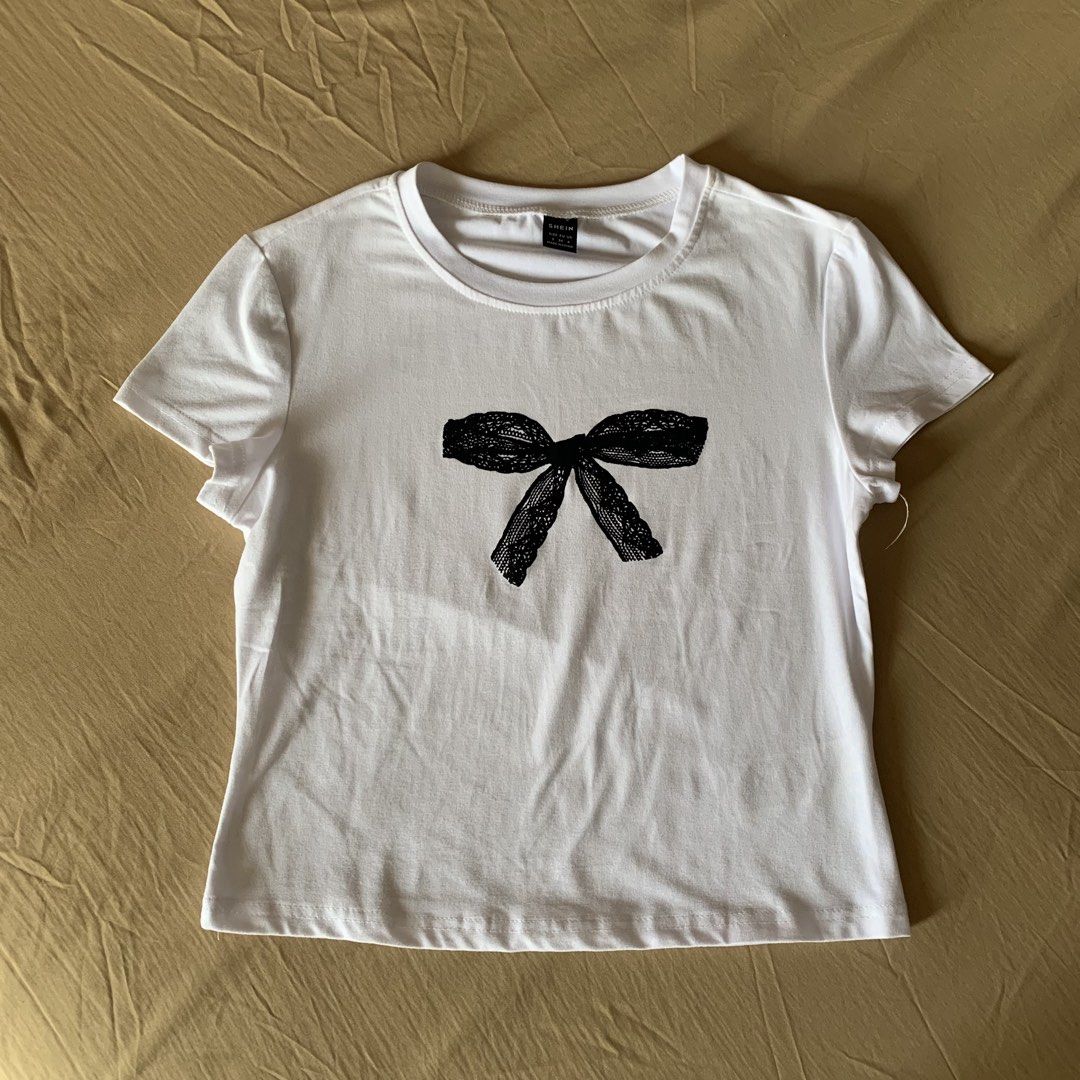 3pcs bundle Top (Cotton On, Shein) (Category: Shirts) located in Rizal. Submitted by ksbentables (Listing ID 1445986881, Image 3). Description: 3pcs Bundle Top SIZES: Cotton On Fruit (w stain) XS Shein Black Ribbon S Pink Coquette Ribbon 10Y Small NO WHEN WORN • loc: cainta, rizal • payment via maribank/gcash • jnt, gogoexpress, lalamove • first to pay, first to secure item • Shipping shouldered by buyer • no cancellation / no return / no refund 