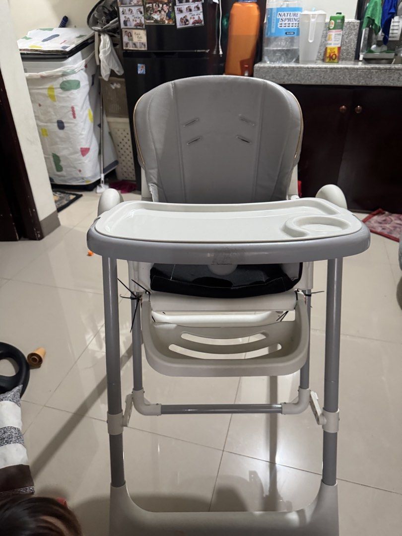 6-in-1 High Chair Adjustable Foldable with Wheels (Category: Chairs) located in Manila. Submitted by alxadgzmn (Listing ID 1446138257, Image 2). Description: - 6-in-1 high chair, adaptable for your child's needs. - Adjustable height and foldable design for convenience. - Built-in wheels for easy mobility around the house. - Removable tray, making cleaning a breeze. - Zip ties are used to secure certain parts, as shown in the photos. - Ideal for b