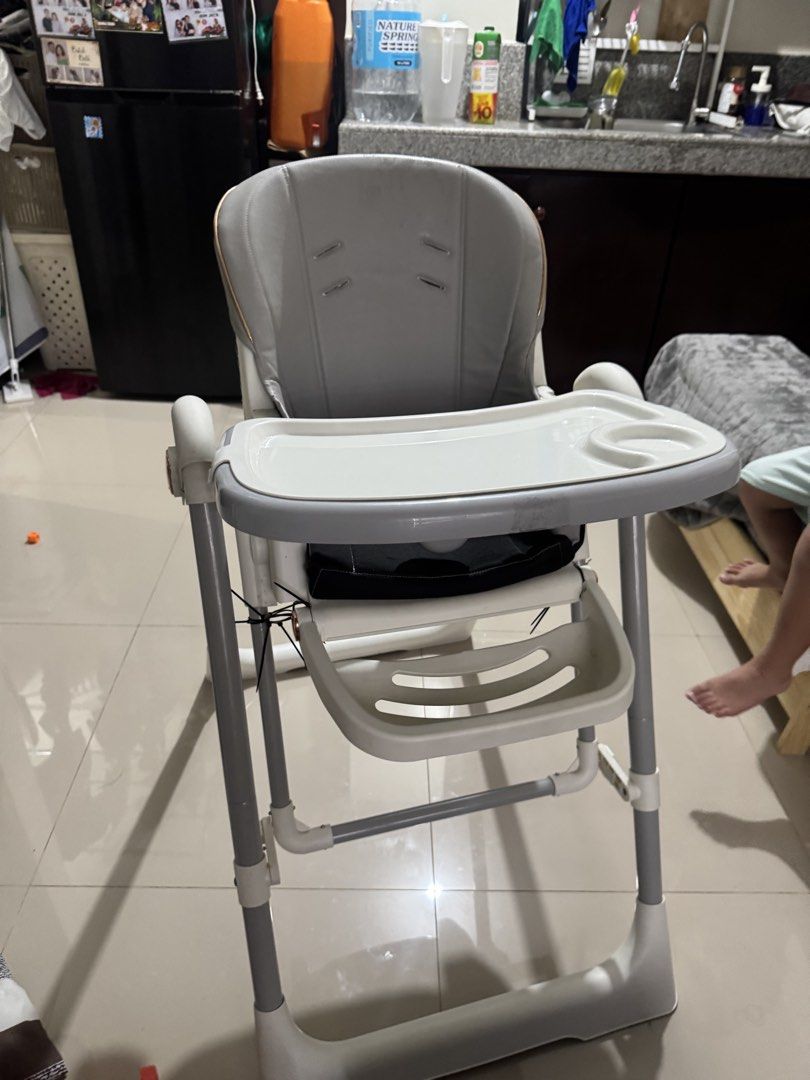 6-in-1 High Chair Adjustable Foldable with Wheels (Category: Chairs) located in Manila. Submitted by alxadgzmn (Listing ID 1446138257, Image 1). Description: - 6-in-1 high chair, adaptable for your child's needs. - Adjustable height and foldable design for convenience. - Built-in wheels for easy mobility around the house. - Removable tray, making cleaning a breeze. - Zip ties are used to secure certain parts, as shown in the photos. - Ideal for b