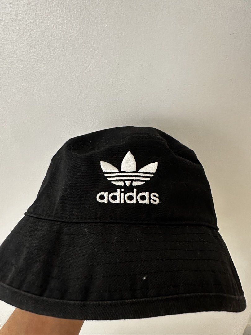 Adidas Bucket Hat Black Trefoil Logo (Category: Hats & Beanies) located in Antipolo. Submitted by sunnysideup323 (Listing ID 1446096982, Image 3). Description: - Classic black Adidas bucket hat - Features iconic embroidered Trefoil logo - One size fits most (OSFM: 57-60cm) - Ideal for sunny weather and adding a sporty vibe Original price: 1,800 RFS: changing style.