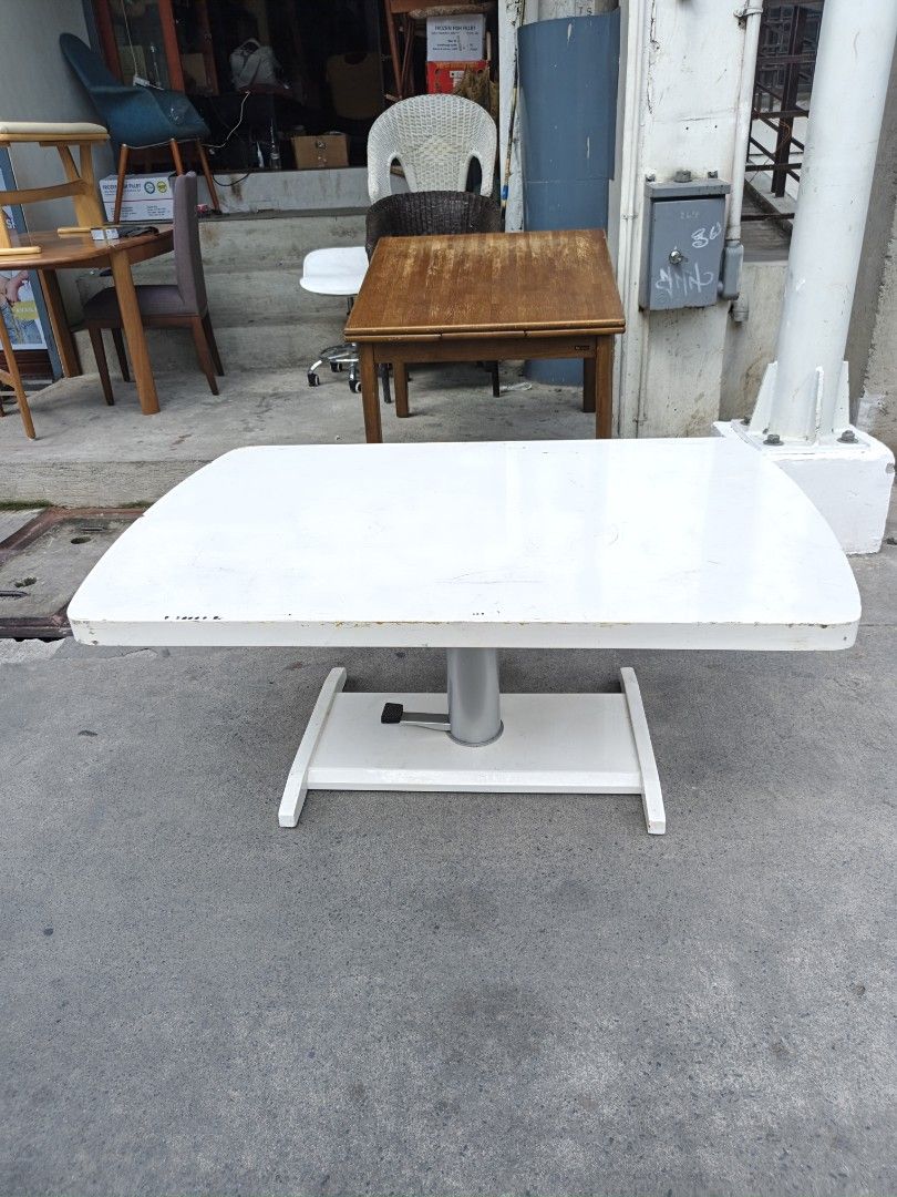 Adjustable Height White Table (Category: Tables & Sets) located in Valenzuela. Submitted by kendra071914 (Listing ID 1446089757, Image 3). Description: - White table with adjustable height - Height range: 53cm to 74cm - Dimensions: 120cm (length) x 80cm (width) - Features a sturdy base - Suitable for various uses.