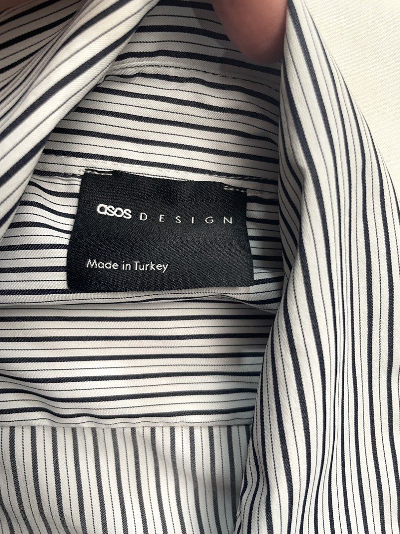 Asos Blue Striped Button Shirt With Shoulder Pads (Category: Blouses) located in Makati City. Submitted by pepperstoremerch (Listing ID 1446127142, Image 2). Description: 30% Off Sale Originally 350 Asos Blue Striped Button Shirt With Shoulder Pads Has loops at the side Size XS Polyester Preloved, good condition Please see pictures D0092 R350.