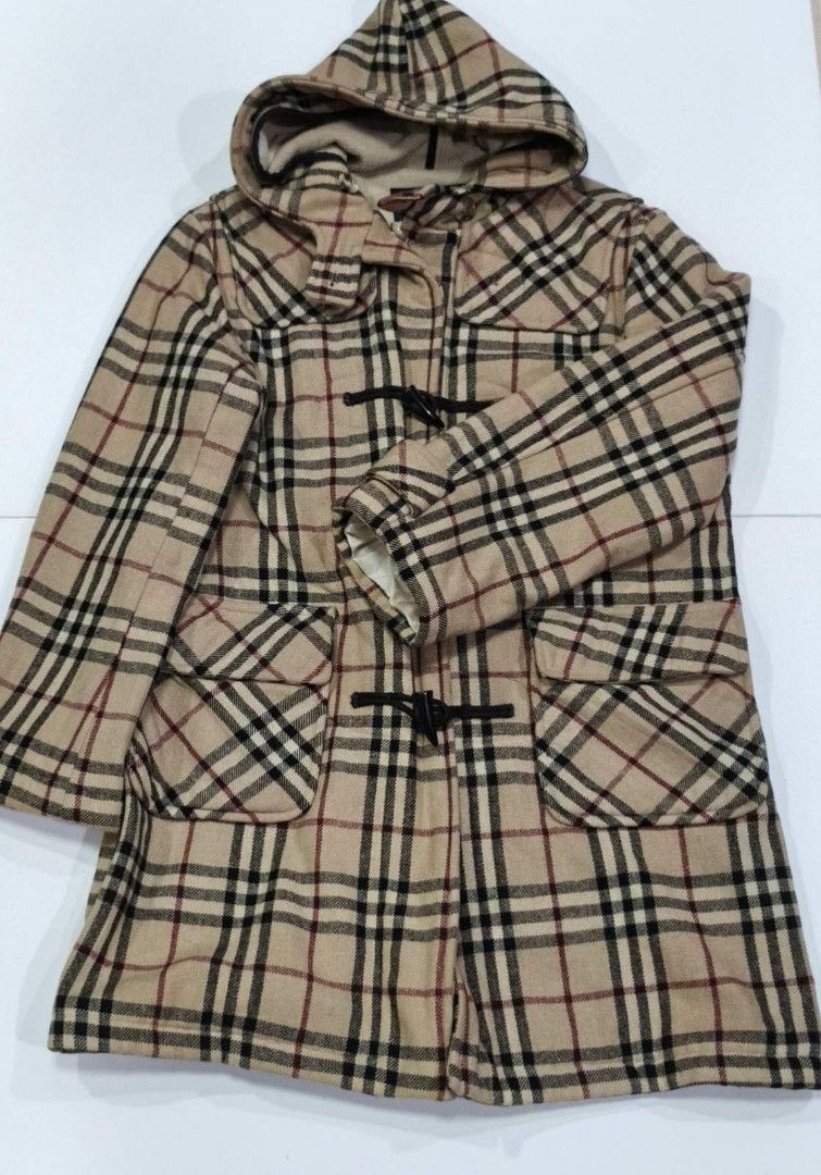 Authentic Burberry Wool Hoodie Coat Size L (Category: Coats, Jackets and Outerwear) located in Aguinaldo. Submitted by designerlaneph (Listing ID 1445997358, Image 1). Description: Previously owned Burberry wool hoodie coat size large 💯% authentic in mint condition free shipping onhand.