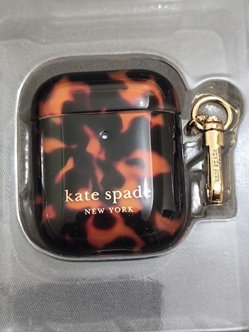 Authentic Kate Spade New York AirPods Case (Category: Portable Audio Accessories) located in Manila. Submitted by iamjame (Listing ID 1446086704, Image 3). Description: - Authentic Kate Spade New York AirPods Case - Stylish tortoiseshell pattern - Includes gold keychain for easy carrying - Compatible with AirPods 1st & 2nd generation - Supports wireless charging - Protects against impacts and drops - Reason for selling: Decluttering and raising e