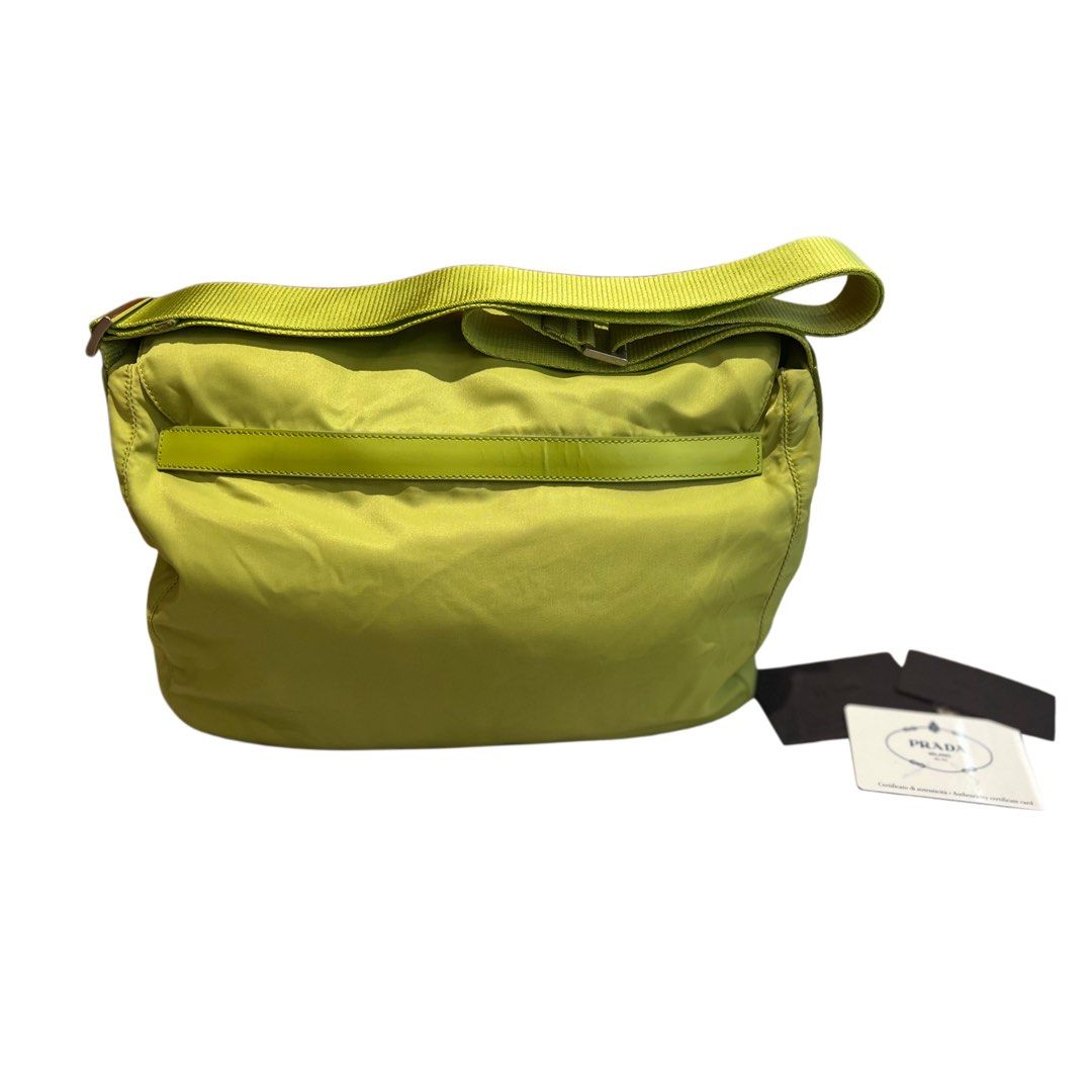Authentic Prada Tessuto Nylon Messenger Bag 💚 (Category: Luxury Bags & Wallets) located in Cavite. Submitted by charmscloset888 (Listing ID 1446003426, Image 2). Description: Prada Tessuto Nylon Messenger Bag 💚 A rare pop of color from Prada’s iconic nylon collection. Crafted from durable Tessuto nylon with leather trim and signature Prada triangle logo, this lightweight messenger is perfect for everyday use. Spacious, practical, and effortless