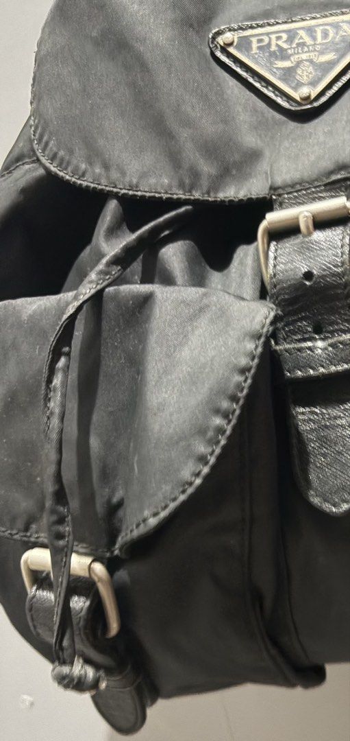 Authentic Vintage Prada Vela Tessuto Nylon Double Pocket Backpack (Black) (Category: Backpacks) located in Makati City. Submitted by lovely.sibug.5953f7 (Listing ID 1445281548, Image 3). Description: Selling an authentic vintage Prada Vela double pocket rucksack in classic Nero (Black). A timeless, lightweight luxury staple that pairs effortlessly with any casual or retro streetwear outfit. Brand: Prada Material: Tessuto Nylon with genuine leathe