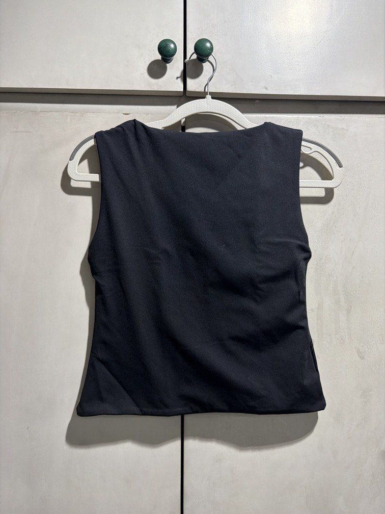 Black Boat Neck Buttery Top (Category: Sleeveless) located in Pasig City. Submitted by _annika (Listing ID 1446096249, Image 1). Description: from a bazaar, i dont remember the brand.