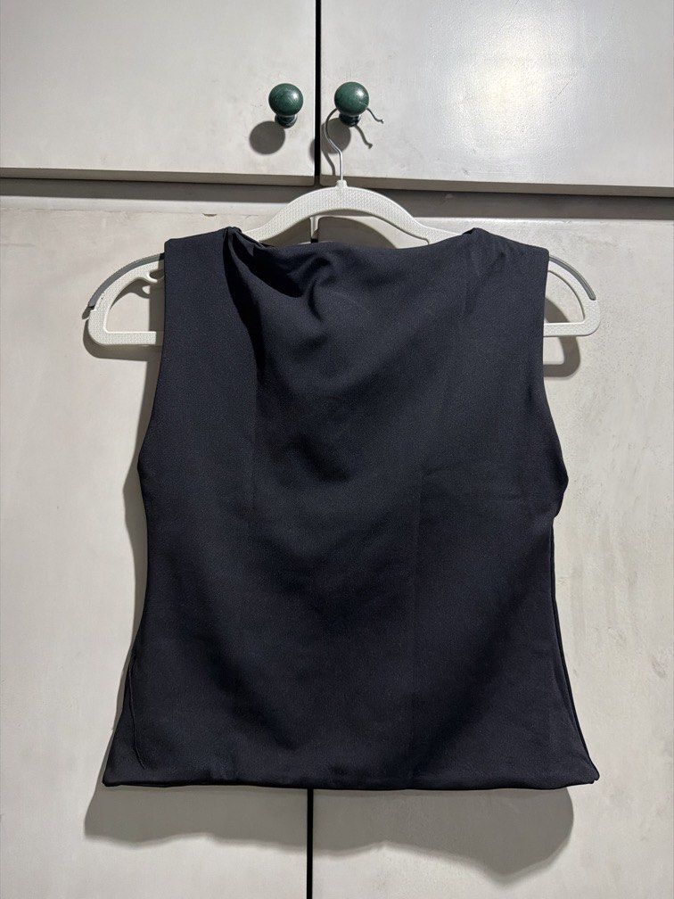 Black Boat Neck Buttery Top (Category: Sleeveless) located in Pasig City. Submitted by _annika (Listing ID 1446096249, Image 2). Description: from a bazaar, i dont remember the brand.