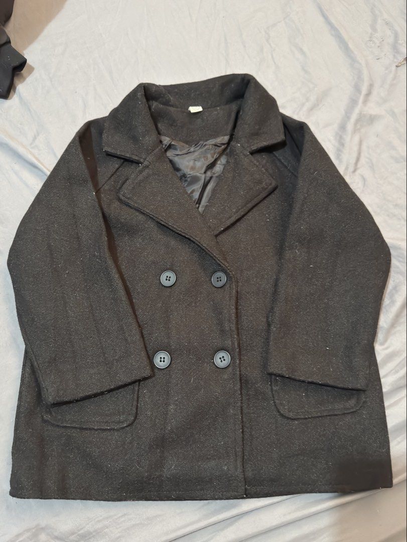 Black Double-Breasted Kids Coat Size 120 (Category: Babies & Kids Fashion) located in Muntinlupa City. Submitted by thechicknit (Listing ID 1445995371, Image 3). Description: - Kids' black double-breasted coat - Size 120 - Two front pockets - Button closure - Lined interior - Ideal for cooler weather.