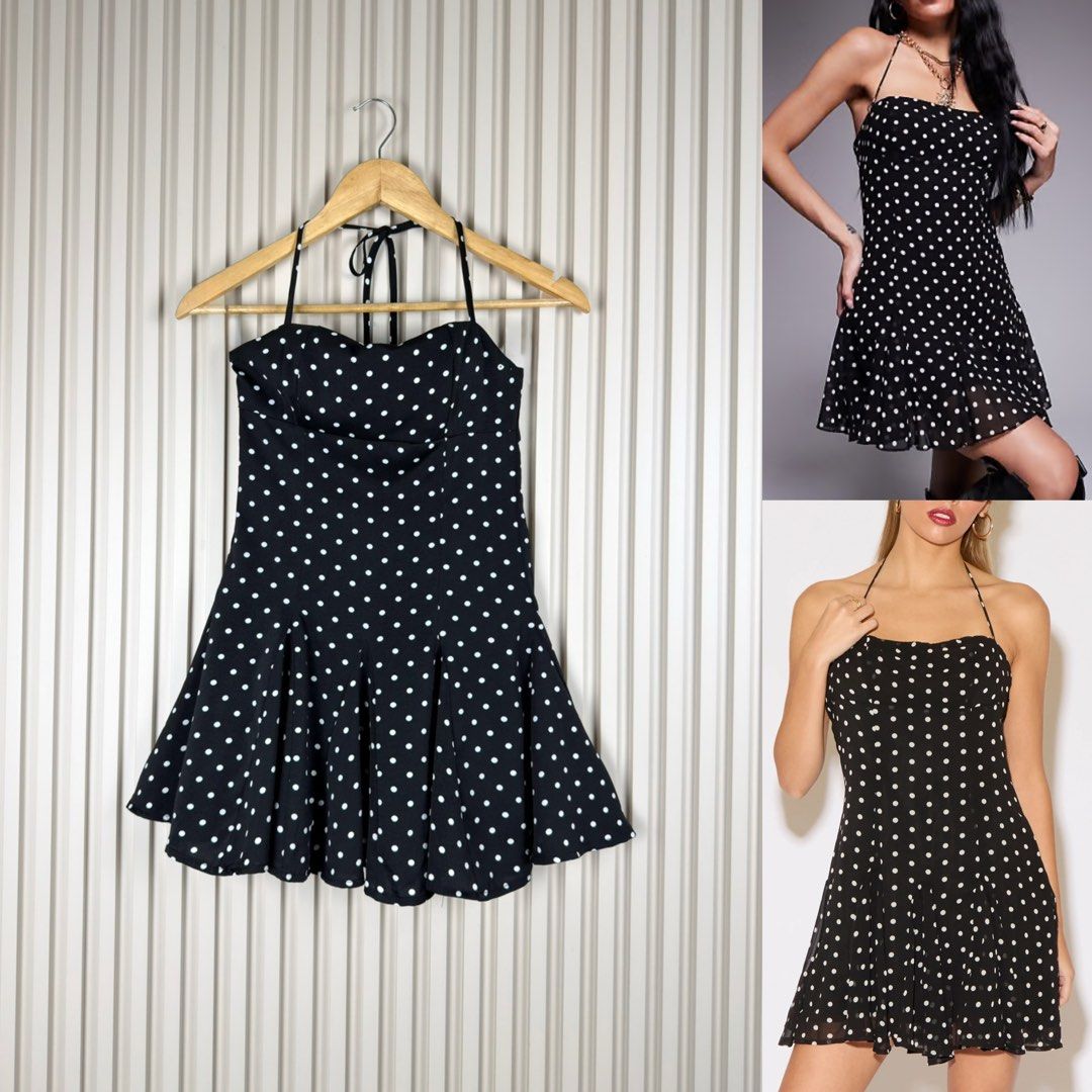 Black Polka Dot Halter Neck Mini Dress (Category: Dresses) located in Pasig City. Submitted by trendapparelph (Listing ID 1446129496, Image 1). Description: - Cute black mini dress - White polka dot pattern - Halter neck with tie closure - Flared skirt for a playful silhouette - Ideal for parties, dates, or a night out - Versatile styling with heels or sandals - Fun and flirty vibe.
