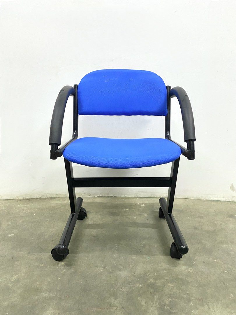 Blue Office Chair with Wheels and Armrests (Category: Chairs) located in Santa Rosa. Submitted by annie_annie83 (Listing ID 1446148023, Image 3). Description: - Blue fabric office chair - Features armrests and wheels for mobility - Sturdy black metal frame - Ideal for home office or study setup.