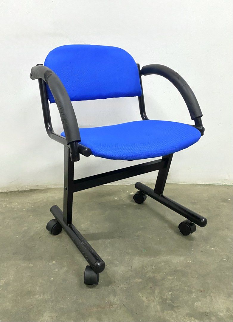 Blue Office Chair with Wheels and Armrests (Category: Chairs) located in Santa Rosa. Submitted by annie_annie83 (Listing ID 1446148023, Image 2). Description: - Blue fabric office chair - Features armrests and wheels for mobility - Sturdy black metal frame - Ideal for home office or study setup.