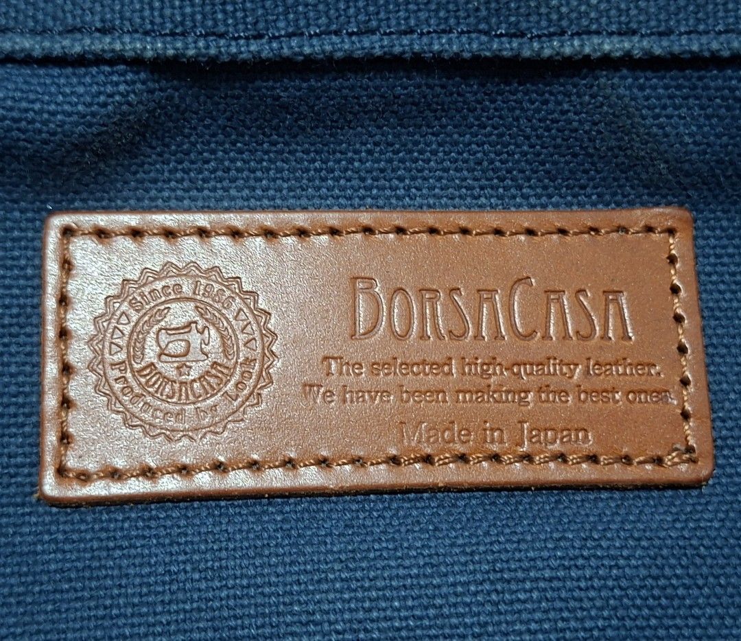 BorsaCasa Canvas Leather Backpack Made in Japan (Category: Backpacks) located in Quezon City. Submitted by moonthrifting (Listing ID 1446120870, Image 3). Description: - Stylish blue canvas backpack with premium brown leather accents. - Secure buckle closure and convenient zip pockets. - Crafted in Japan by Borsa a Casa, known for quality. - Made with high-quality leather for durability. - Ideal for everyday use, combining style and function..