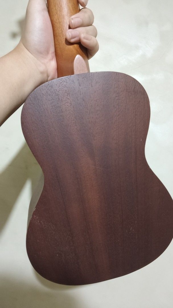 Brown Ukulele with Floral Cutouts (Category: Musical Instruments) located in Mandaluyong City. Submitted by chalmerzzz (Listing ID 1445994680, Image 3). Description: Selling my pre-loved Fernando Ukulele for only 1,800 pesos feel free to chat for negotiations -brown with floral cutouts very cute issues: may signs of usage: gasgas.