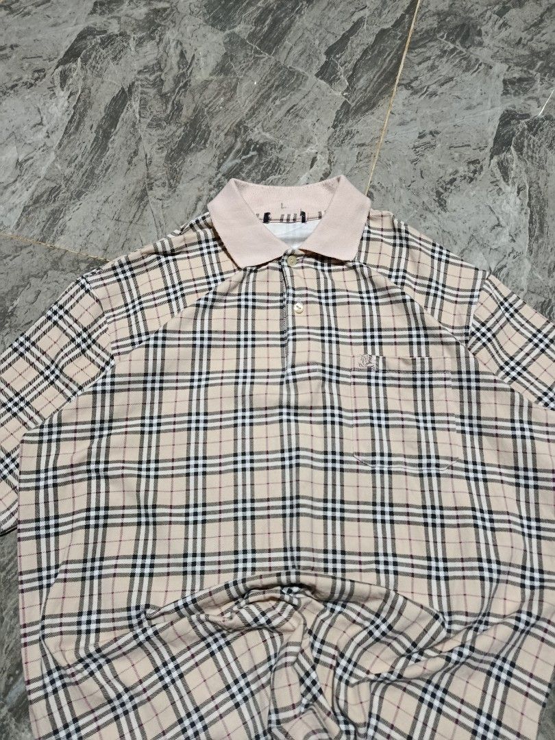 Burberry Nova Check polo shirt (Category: Tshirts & Polo Shirts ) located in Prosperidad. Submitted by basicdept07 (Listing ID 1446148924, Image 2). Description: Burberry Nova Check polo shirt Mine:🏷️249+sf Dimes: 22 width/ 27.5 length Complete tags Color rate and condition: 9/10 cut neck tag, minimal lint sa collar, 1 pinhole sa back Kindly dm if interested 📥.