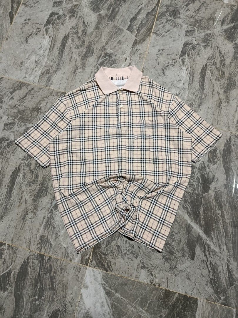Burberry Nova Check polo shirt (Category: Tshirts & Polo Shirts ) located in Prosperidad. Submitted by basicdept07 (Listing ID 1446148924, Image 1). Description: Burberry Nova Check polo shirt Mine:🏷️249+sf Dimes: 22 width/ 27.5 length Complete tags Color rate and condition: 9/10 cut neck tag, minimal lint sa collar, 1 pinhole sa back Kindly dm if interested 📥.