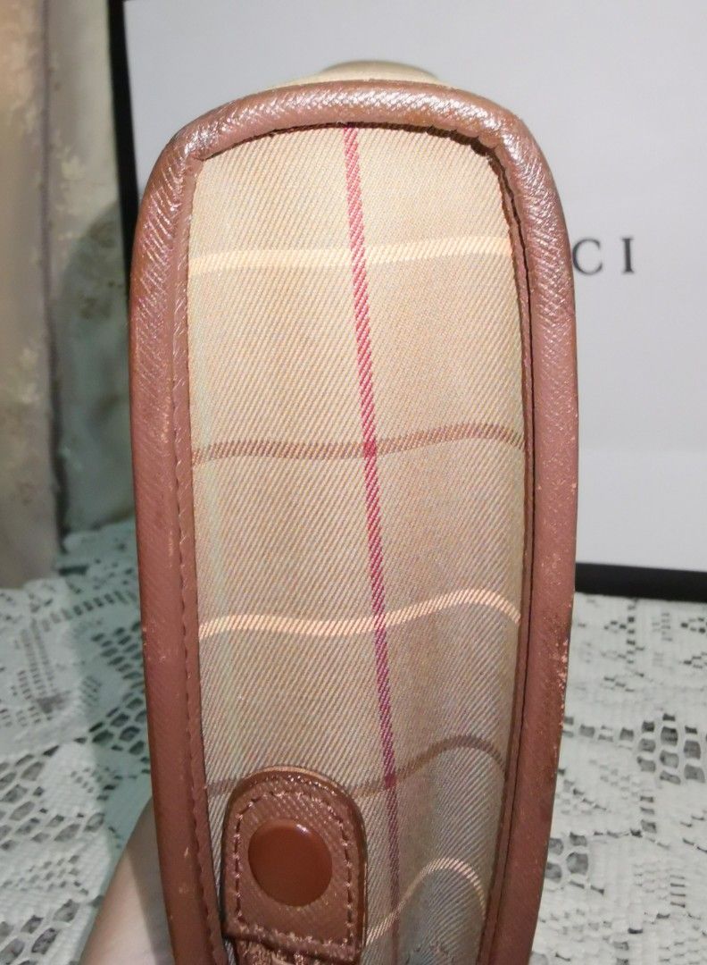 Burberry Clutch Bag (Category: Luxury Bags & Wallets) located in Angeles City. Submitted by jcshomefinds (Listing ID 1446062195, Image 3). Description: BURBERRY NOVA CHECK CLUTCH BAG On hand Authentic/Original Canvas beige Secure zipper closure Interior slip pocket for organization Approximate dimensions: 11 inches (length) x 8 inches (height) Very good condition Entrupy Certified 💁‍♀️Trusted trader since 2017 🏦BPI / Gcash.