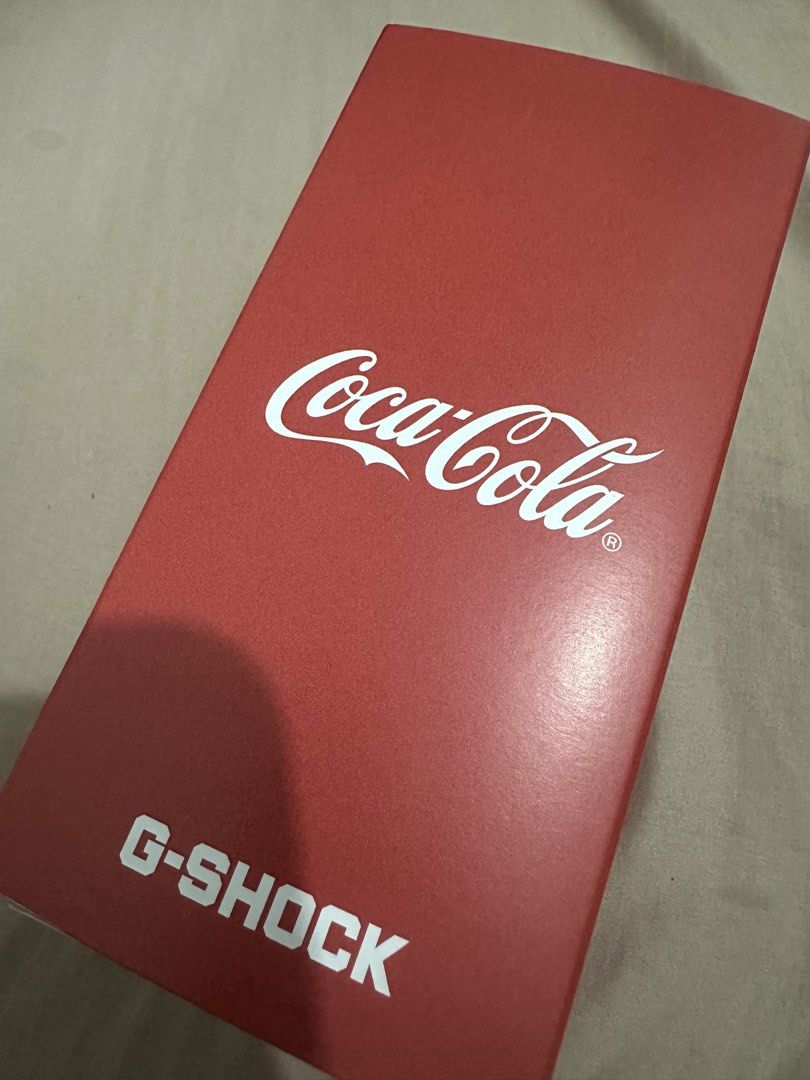 Casio G-Shock Coca-Cola GA-2100CC-3A Watch (Category: Men's Watches) located in Makati City. Submitted by crisdlf (Listing ID 1446140518, Image 2). Description: Selling a limited edition G-Shock x Coca-Cola watch. This is the GA-2100CC-3ADR model. Features a transparent green bezel and band. The dial has a Coca-Cola design. - 💯 authentic - complete with box, manual and warranty card Meetup: Makati I have 3 pieces onhand (more discounts if you bu