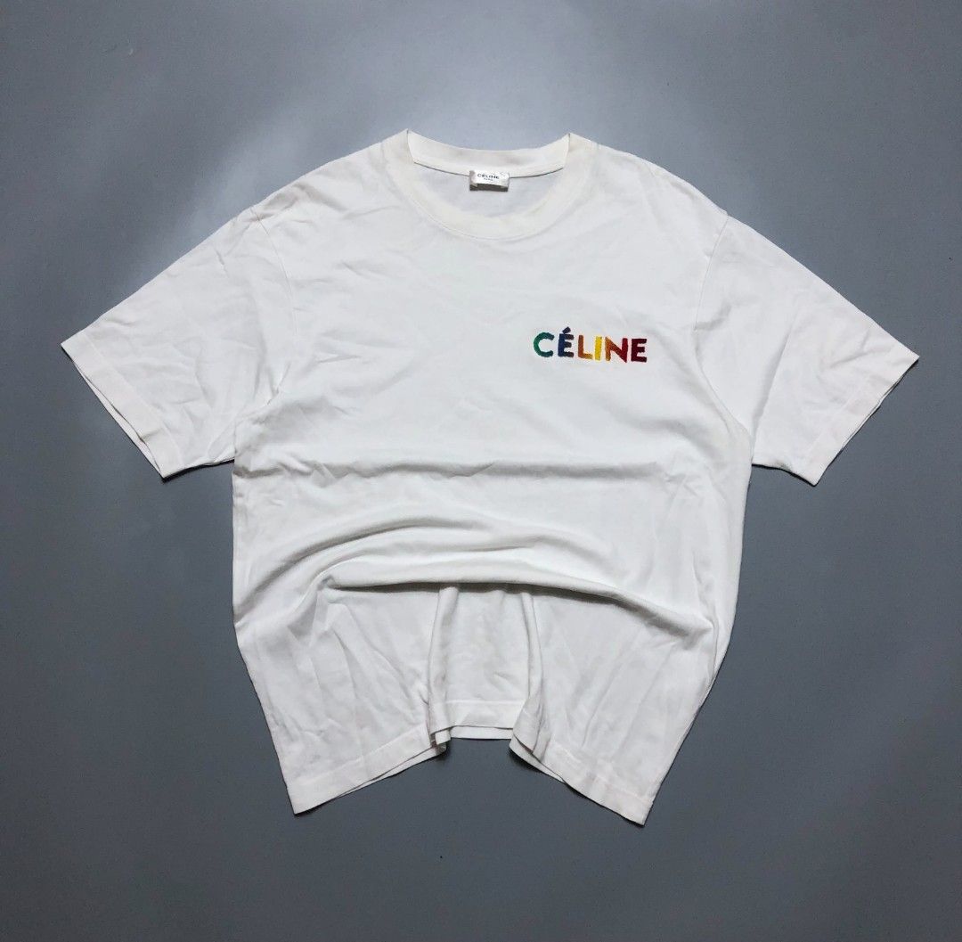 Celine Paris White T-Shirt Rainbow Logo (Category: Tshirts & Polo Shirts ) located in Cavite. Submitted by autothrift (Listing ID 1446084625, Image 1). Description: DIMES 21/27 COLOR RATE 9/10 NO ISSUE FLAWLESS NEED WASH .