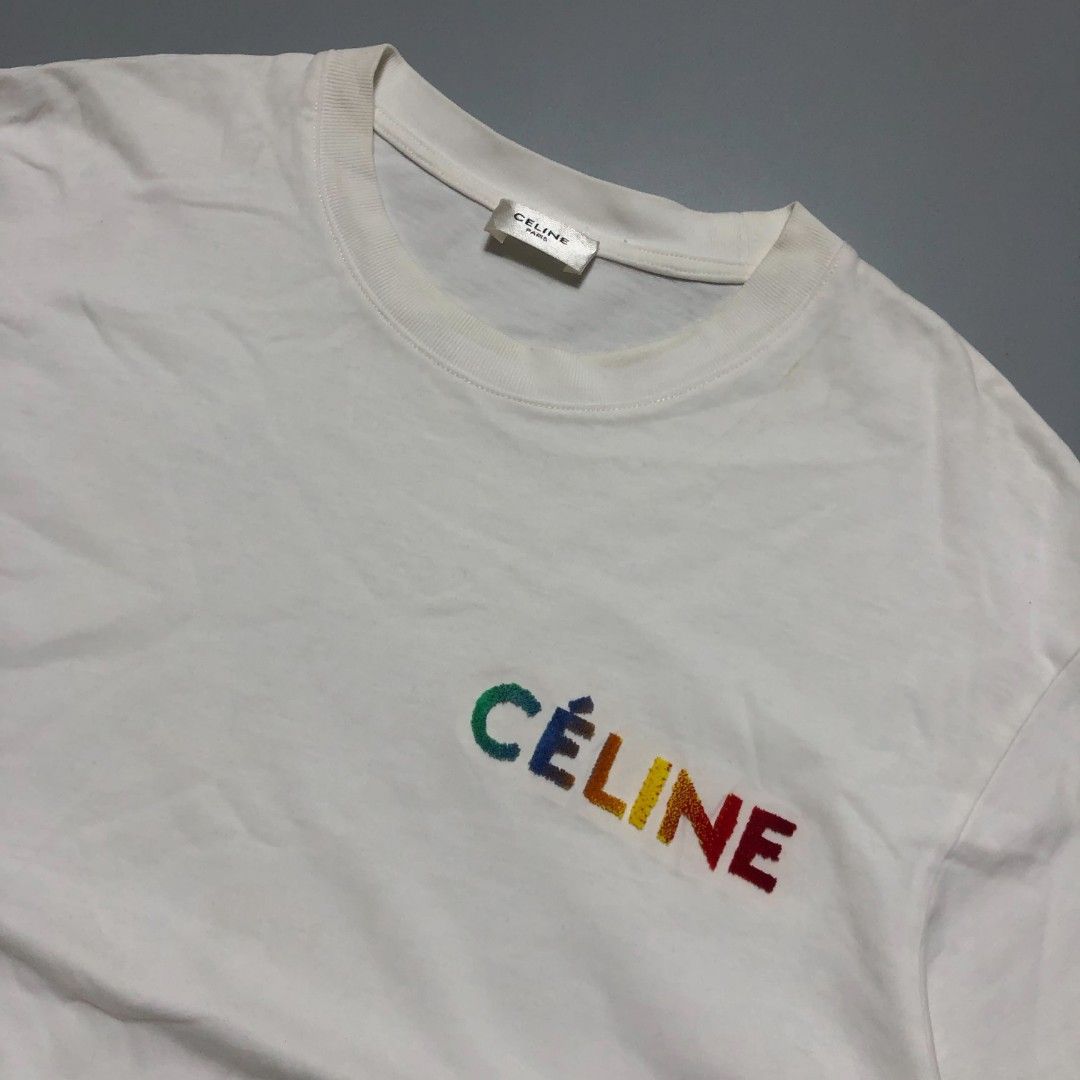 Celine Paris White T-Shirt Rainbow Logo (Category: Tshirts & Polo Shirts ) located in Cavite. Submitted by autothrift (Listing ID 1446084625, Image 2). Description: DIMES 21/27 COLOR RATE 9/10 NO ISSUE FLAWLESS NEED WASH .