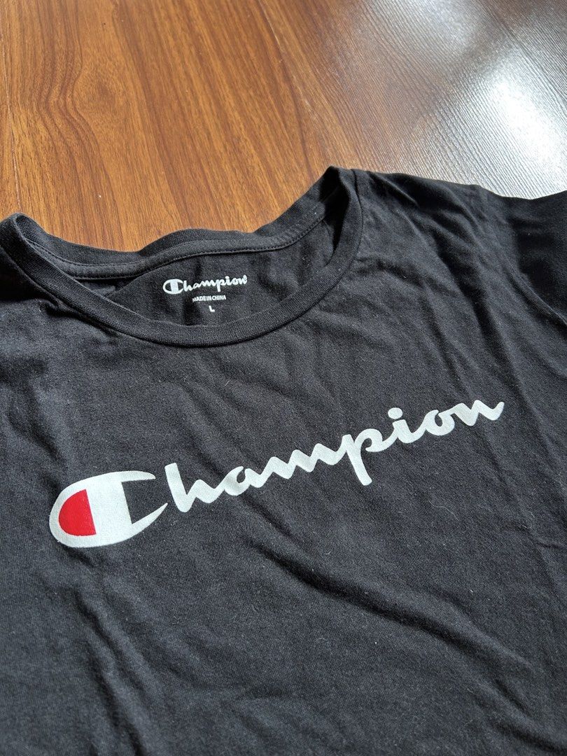 Champion T-shirt Black Size L (Category: Tshirts & Polo Shirts ) located in Quezon City. Submitted by sdnncmp (Listing ID 1446049714, Image 3). Description: Authentic Champion T-Shirt - size L on tag, good for size M also Dm for any inquiries or questions.