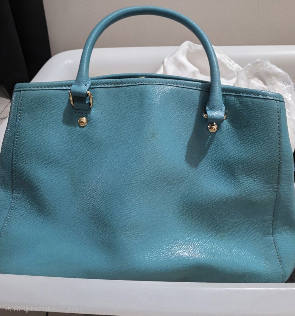 Coach Teal Crossbody Bag (Category: Cross-body Bags) located in Mandaluyong City. Submitted by mlstuff28 (Listing ID 1446100292, Image 2). Description: -Authentic -This is lightly used but stains appear due to long period of storage -Hardware in very good condition, still shiny Mop:bank transfer/gcash.