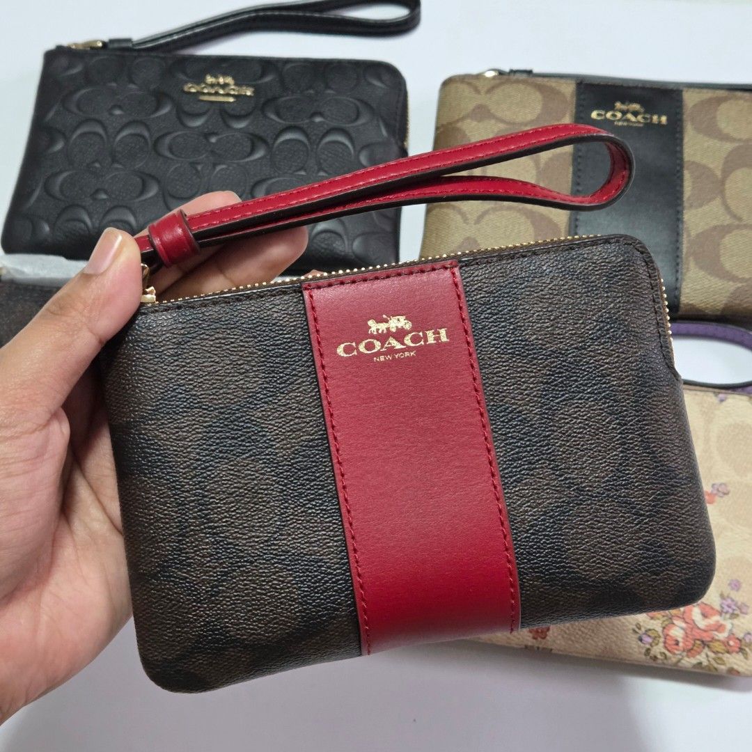 Coach wristlet (Category: Luxury Bags & Wallets) located in Urdaneta. Submitted by shophard_ph (Listing ID 1446111495, Image 1). Description: brandnew onhand last 1.