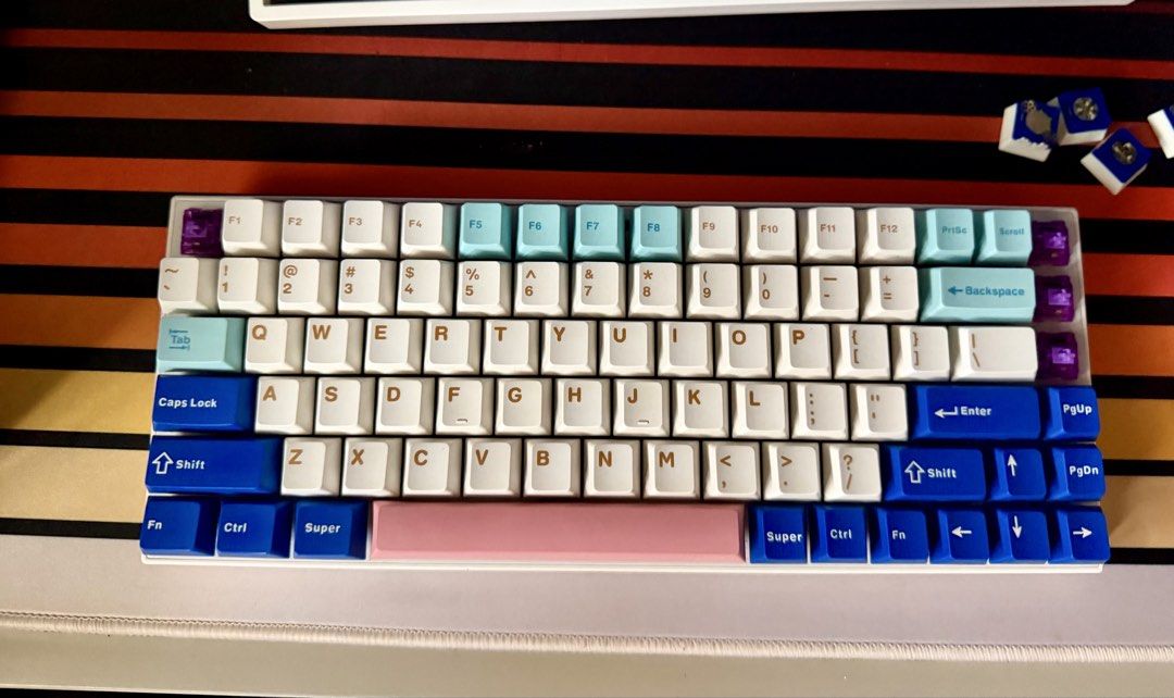 Custom Mechanical Keyboard with Pink Cable and Keycaps (Category: Computer Keyboard) located in Quezon City. Submitted by espneon (Listing ID 1446078549, Image 1). Description: Hello! I'm selling some keyboard stuff that I don't use anymore to pay off some medical bills. Royal Kludge 84 Tri-mode, in good condition (no issues) - with Akko Lavender purples - ₱1,200 Keycap sets (would love to sell these with the keyboard and switches), bought from Y