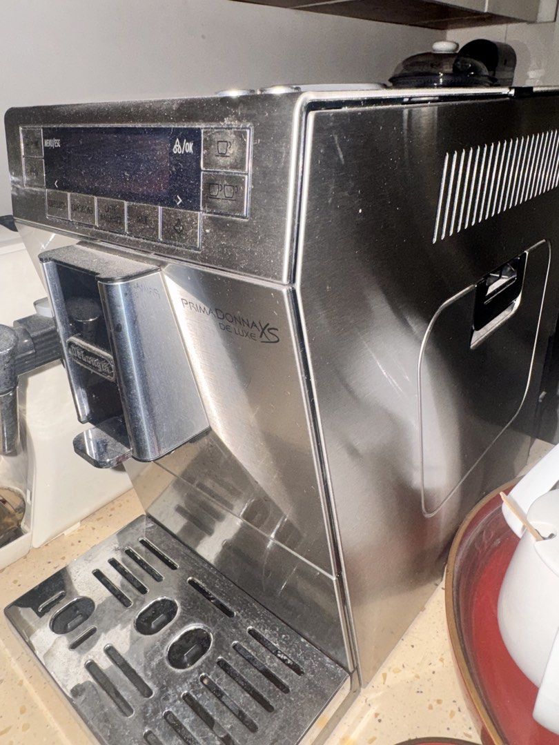 DeLonghi PrimaDonna XS Deluxe Automatic Coffee Machine (Category: Coffee Machines & Makers) located in Mandaluyong City. Submitted by djposhop (Listing ID 1446061392, Image 2). Description: DeLonghi PrimaDonna XS Deluxe automatic coffee machine - stainless steel finish - Carafe not included - Reason for selling: would want to upgrade Last service was 2024 Fully functional. Currently in use until “upgrade” to a manual machine Pick up San Juan .